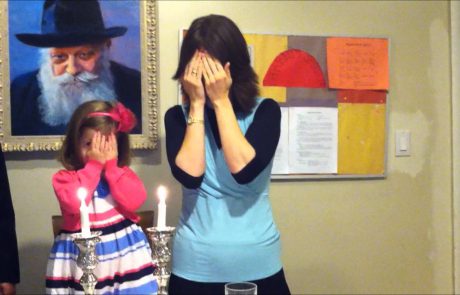 Young Girl Lights Her First Shabbat Candle