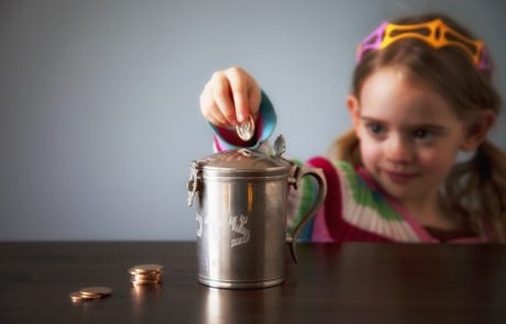 The Connection Between Giving Tzedakah and Shabbat Candle Lighting